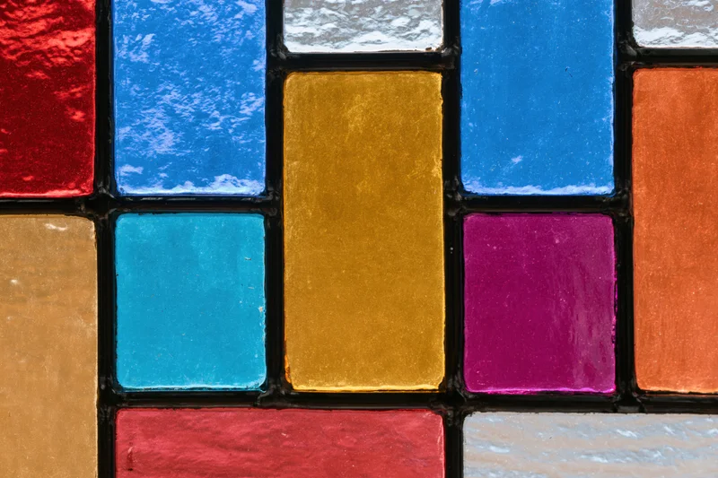 Close-up flat shot of a geometric stained glass window panel