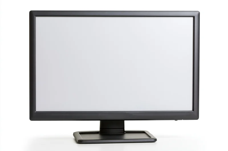 Dark charcoal computer monitor with blank white screen isolated on white background