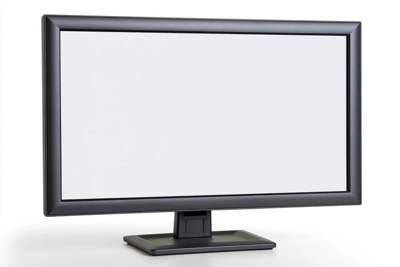 Dark charcoal computer monitor with blank white screen on white background