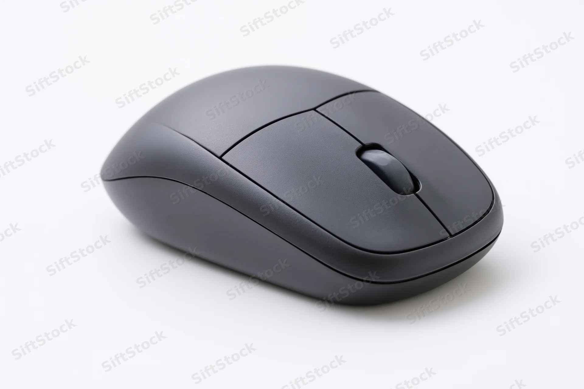 Matte black wireless computer mouse on plain white surface