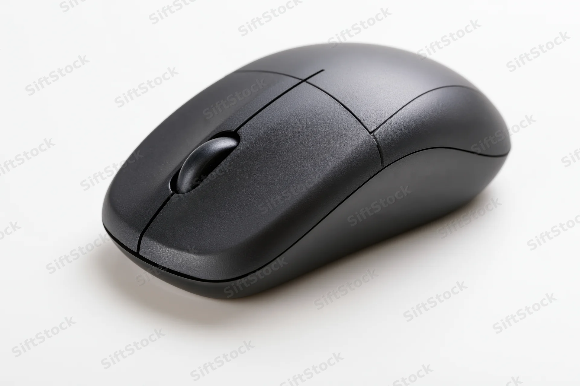 Matte black wireless computer mouse on plain white surface