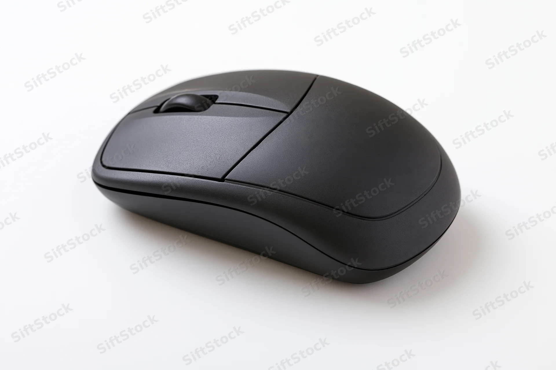 Matte black wireless computer mouse on plain white surface