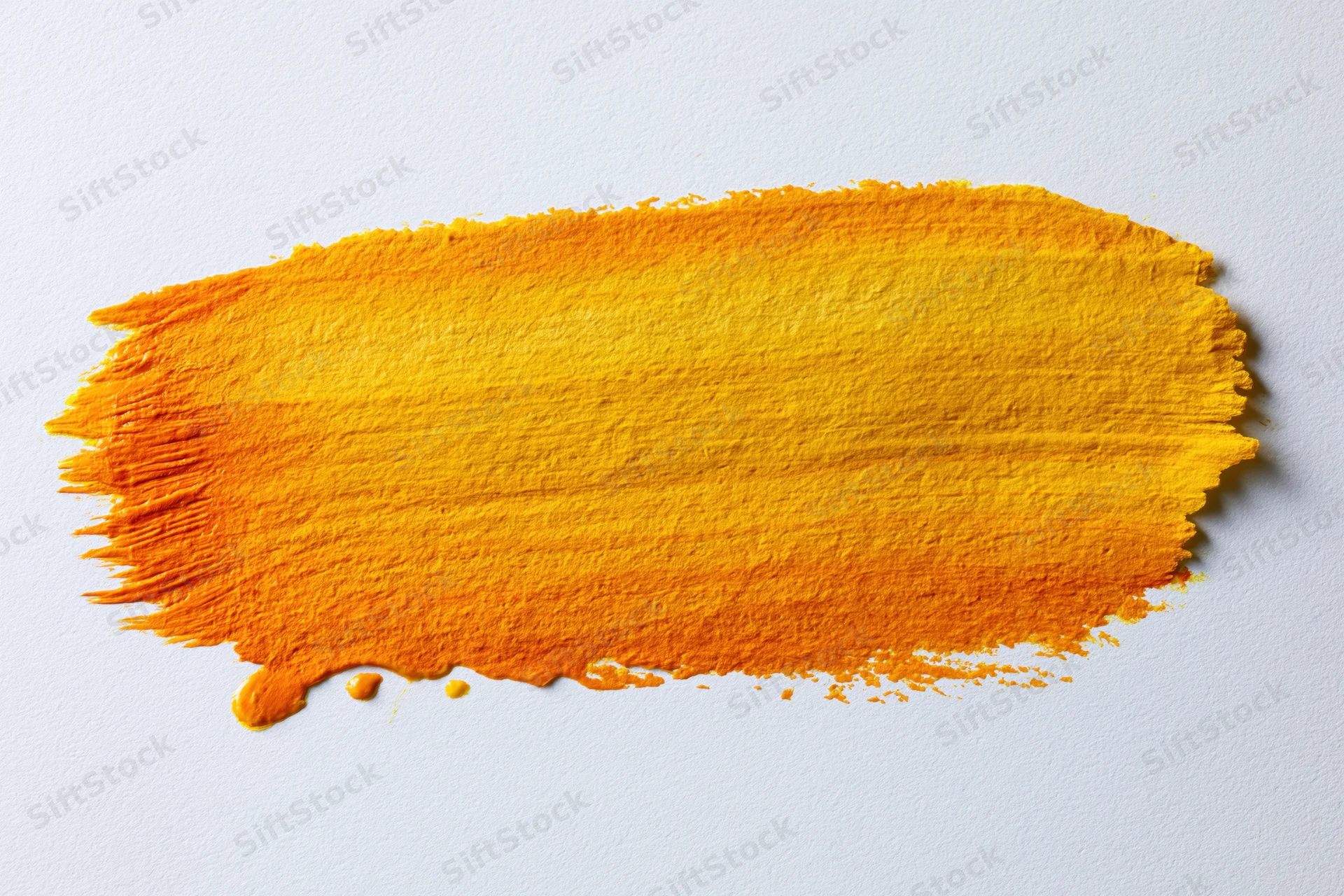 Broad horizontal watercolor brushstroke in orange and yellow gradient on white paper