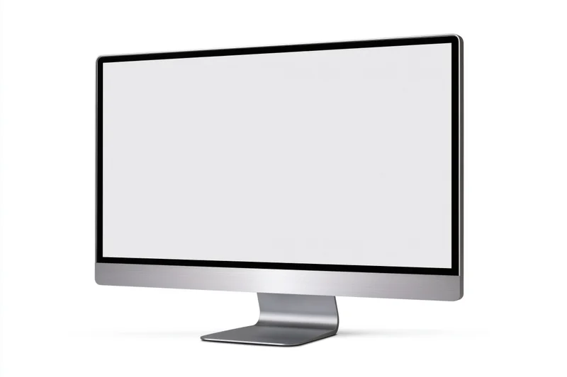 Slim desktop computer monitor with blank white screen on white background