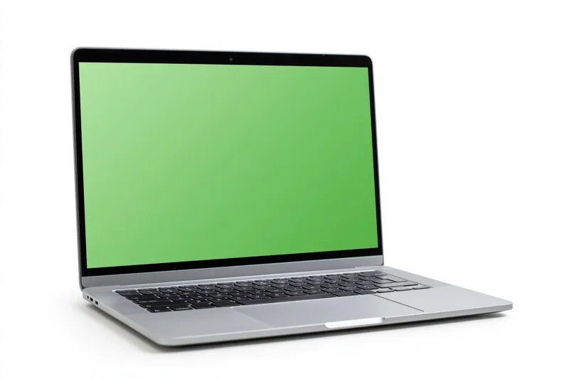 Silver aluminum laptop with green screen display on white background