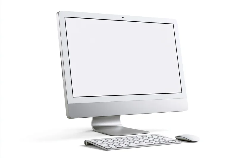 All-in-one desktop computer with blank white screen and wireless keyboard and mouse on white background