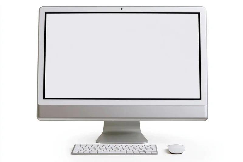 All-in-one desktop computer with blank white screen and peripherals on white background