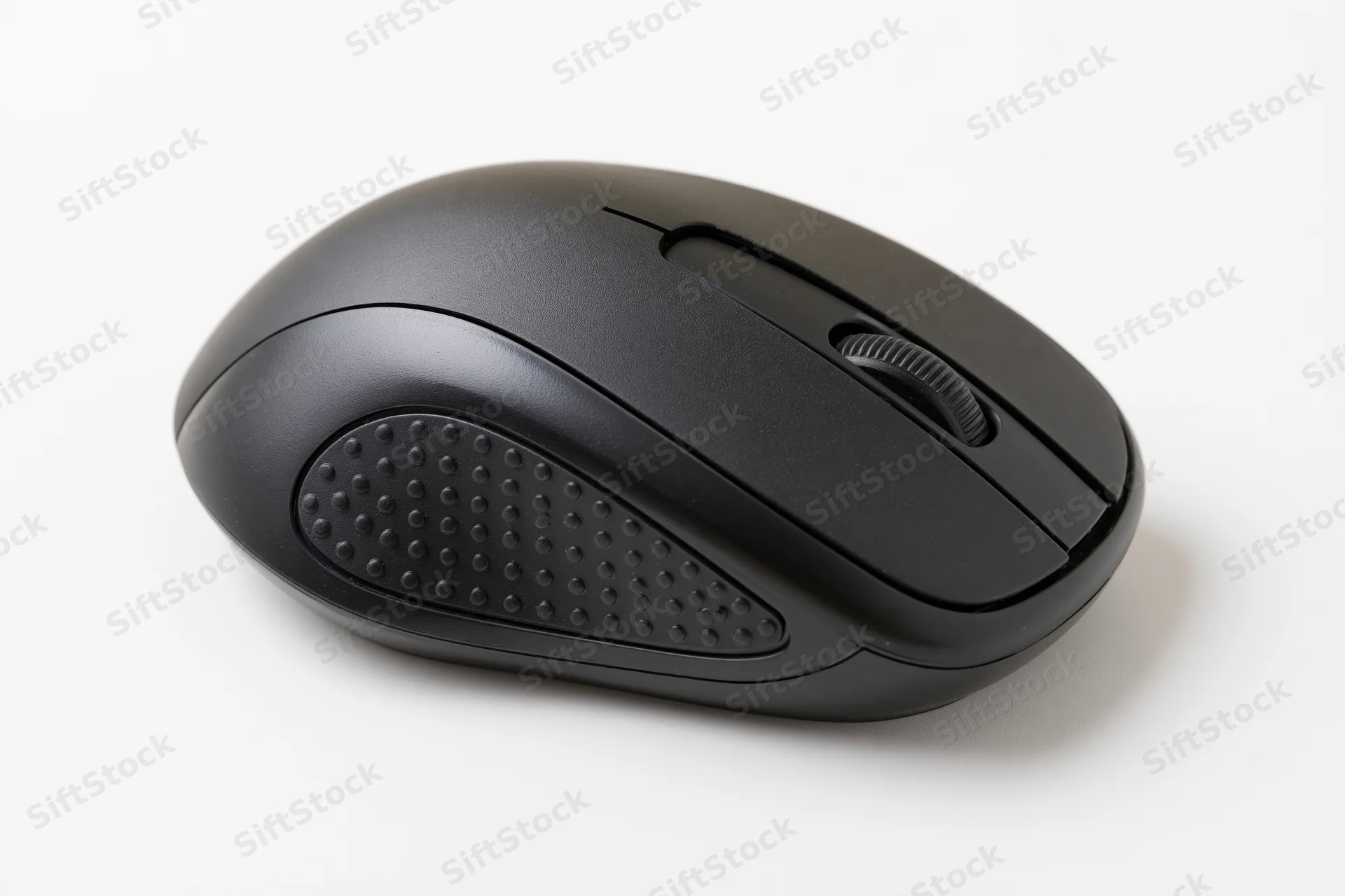 Black wireless computer mouse on plain white surface