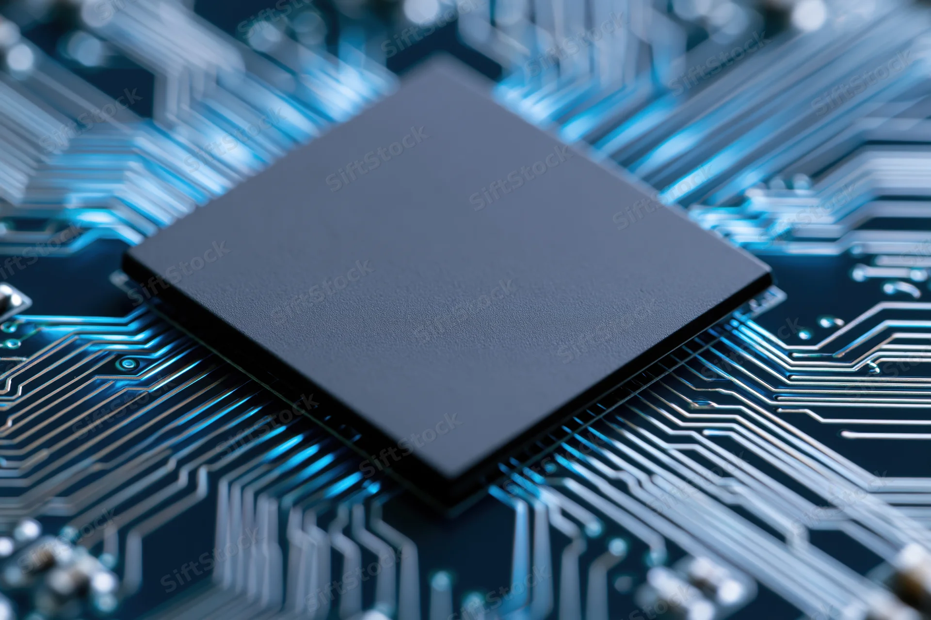 Square cpu processor chip on a glowing blue circuit board