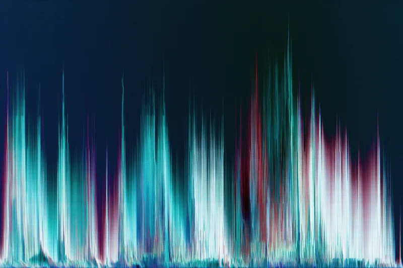Digital screen glitch artifact filling the frame with vertical color streaks on dark background