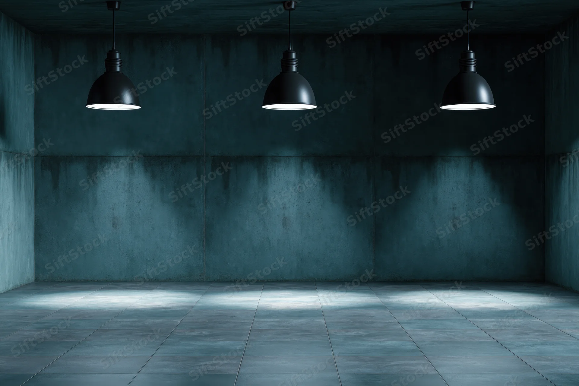 Empty industrial room with three black pendant lamps hanging from ceiling, concrete walls and tiled floor