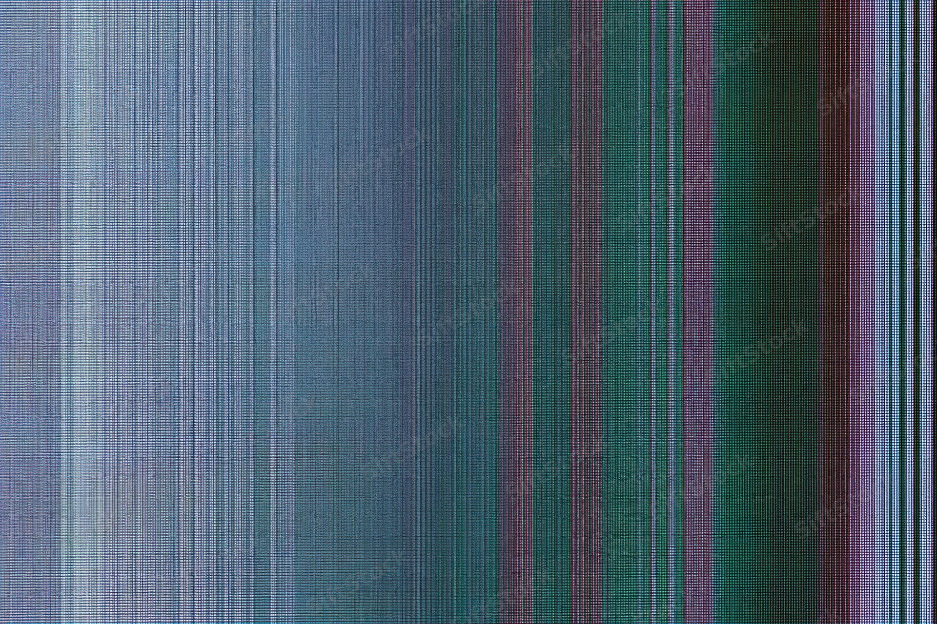 Extreme close-up of lcd screen surface showing pixel grid and color stripes