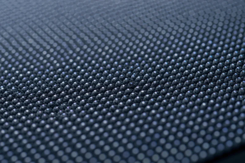 Close-up of led display panel surface showing pixel grid pattern