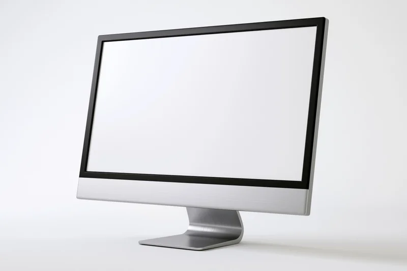 Modern all-in-one computer monitor with blank white screen on white background
