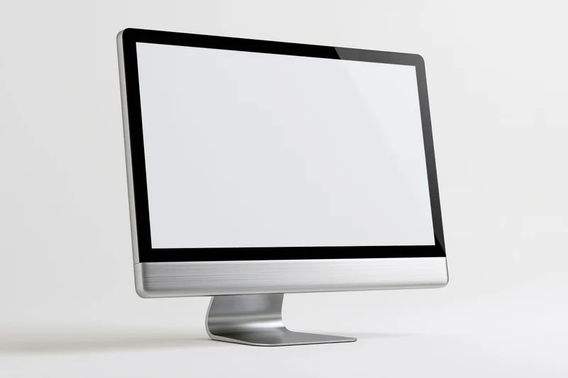 Modern all-in-one desktop computer monitor with blank white screen on plain white background