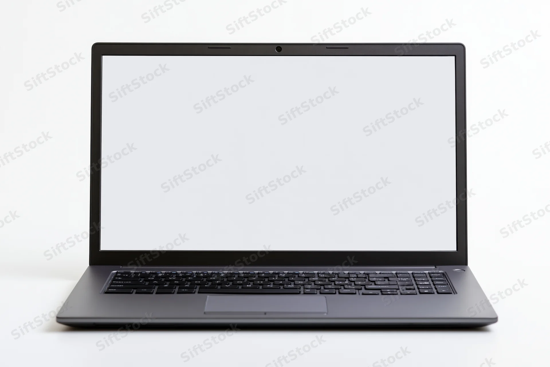 Open dark aluminum laptop with blank white screen on white background