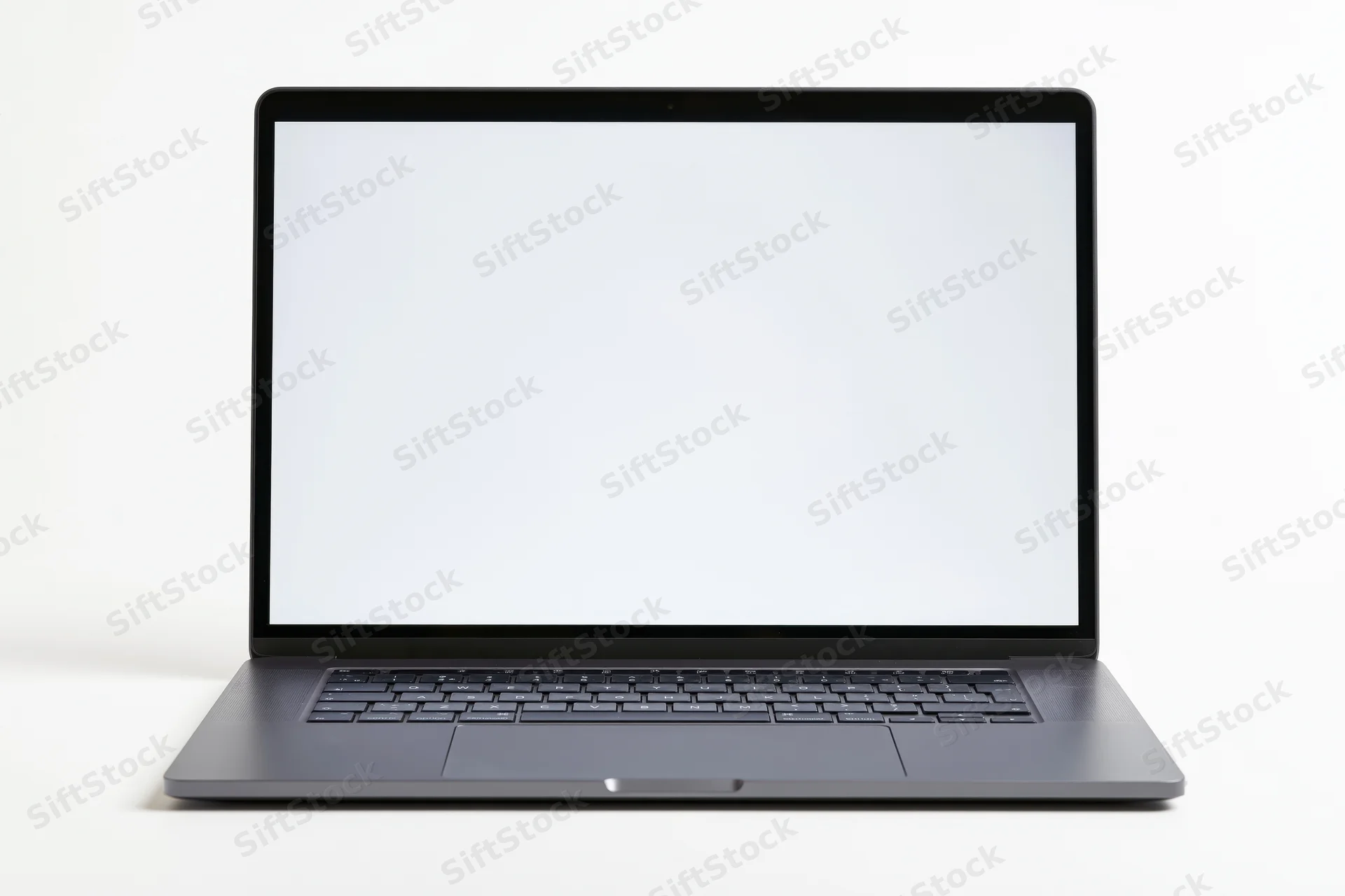 Open dark aluminum laptop with blank white screen on white surface