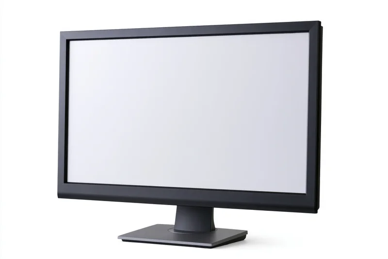 Modern flat-screen computer monitor with blank white screen isolated on white background