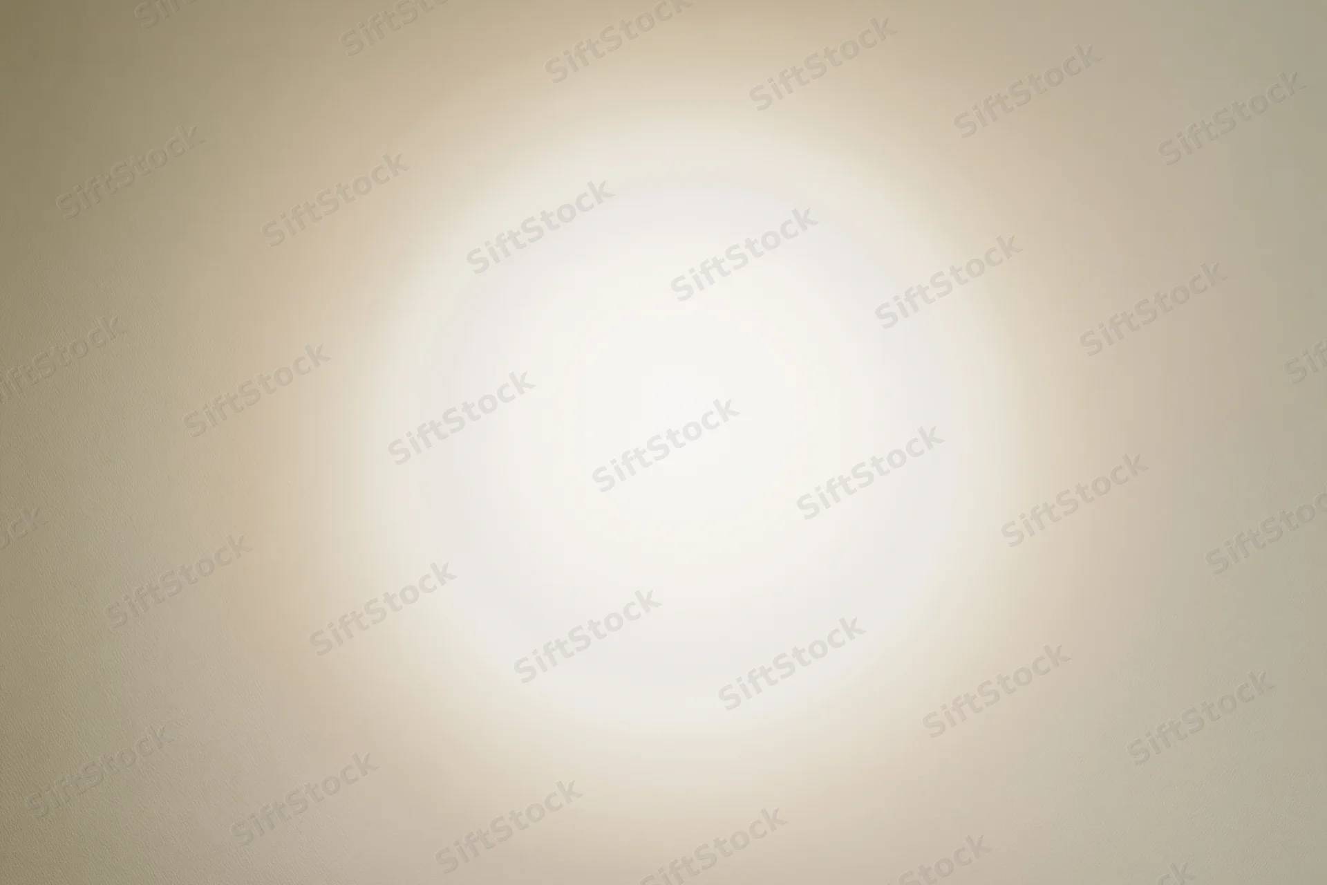 Soft radial vignette on off-white background with central glow