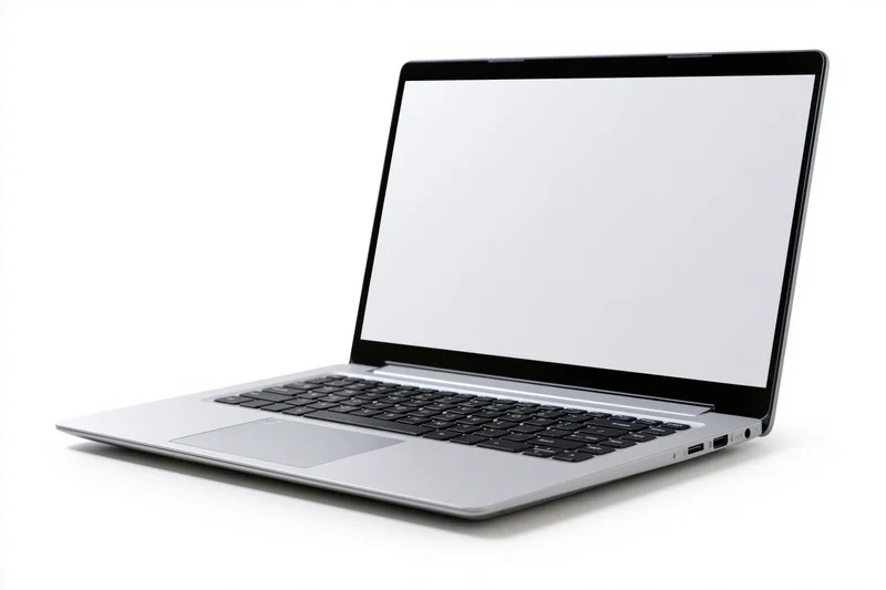 Silver laptop with blank white screen open at an angle on white background