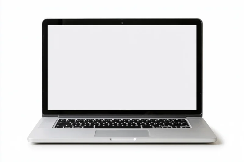 Open silver aluminum laptop with blank white screen on white background