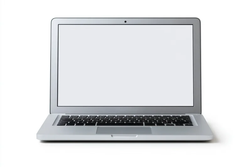 Silver aluminum laptop open with blank white screen centered on white background