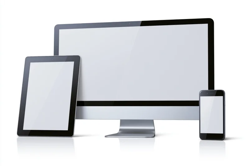 Desktop monitor, tablet, and smartphone with blank screens arranged together on white surface