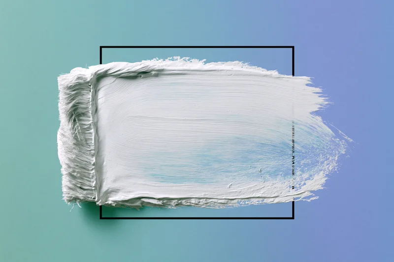 White paint brushstroke on a smooth gradient background with black frame