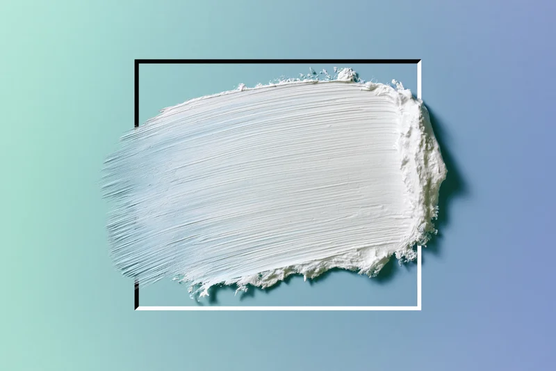 White paint brushstroke on a smooth gradient background with frame border