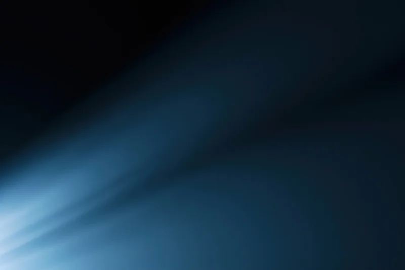 Abstract dark blue gradient background with smooth tonal transition