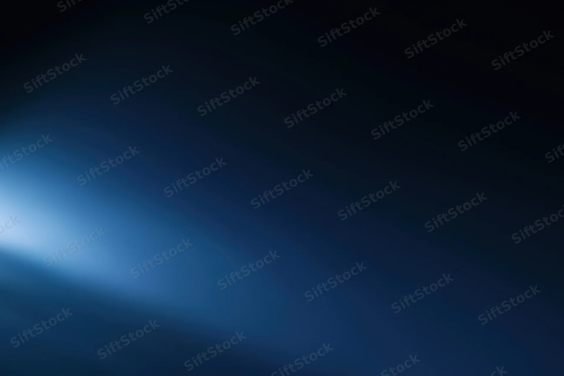 Smooth dark blue gradient background with soft light transition