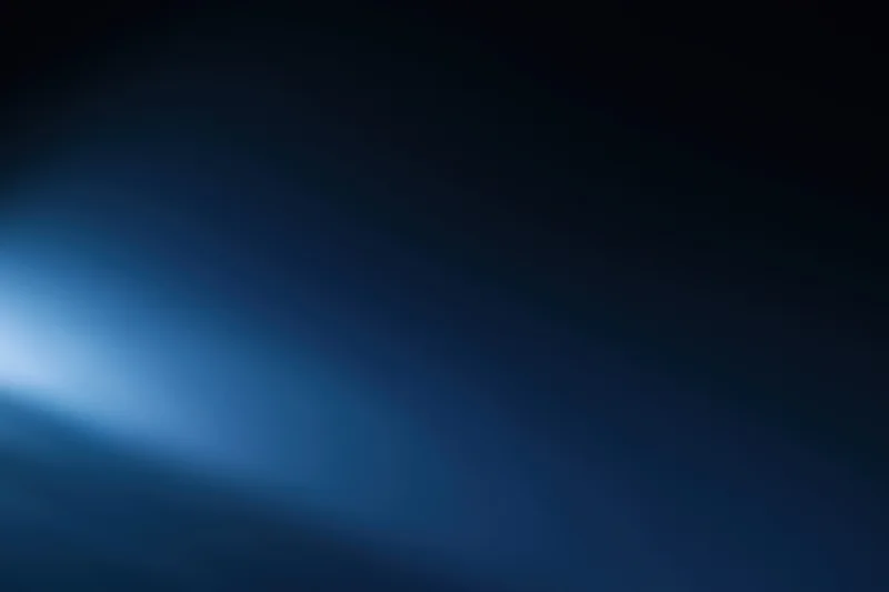 Smooth dark blue gradient background with soft light transition