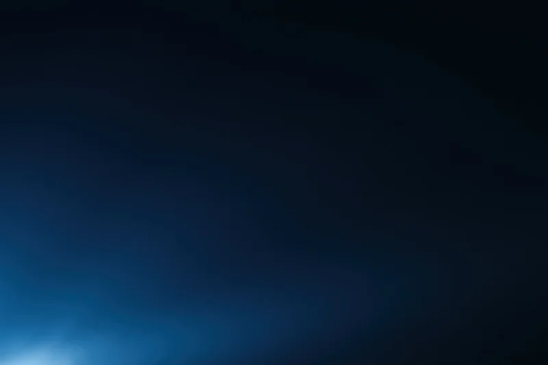 Smooth navy blue gradient transitioning from dark to light across the frame