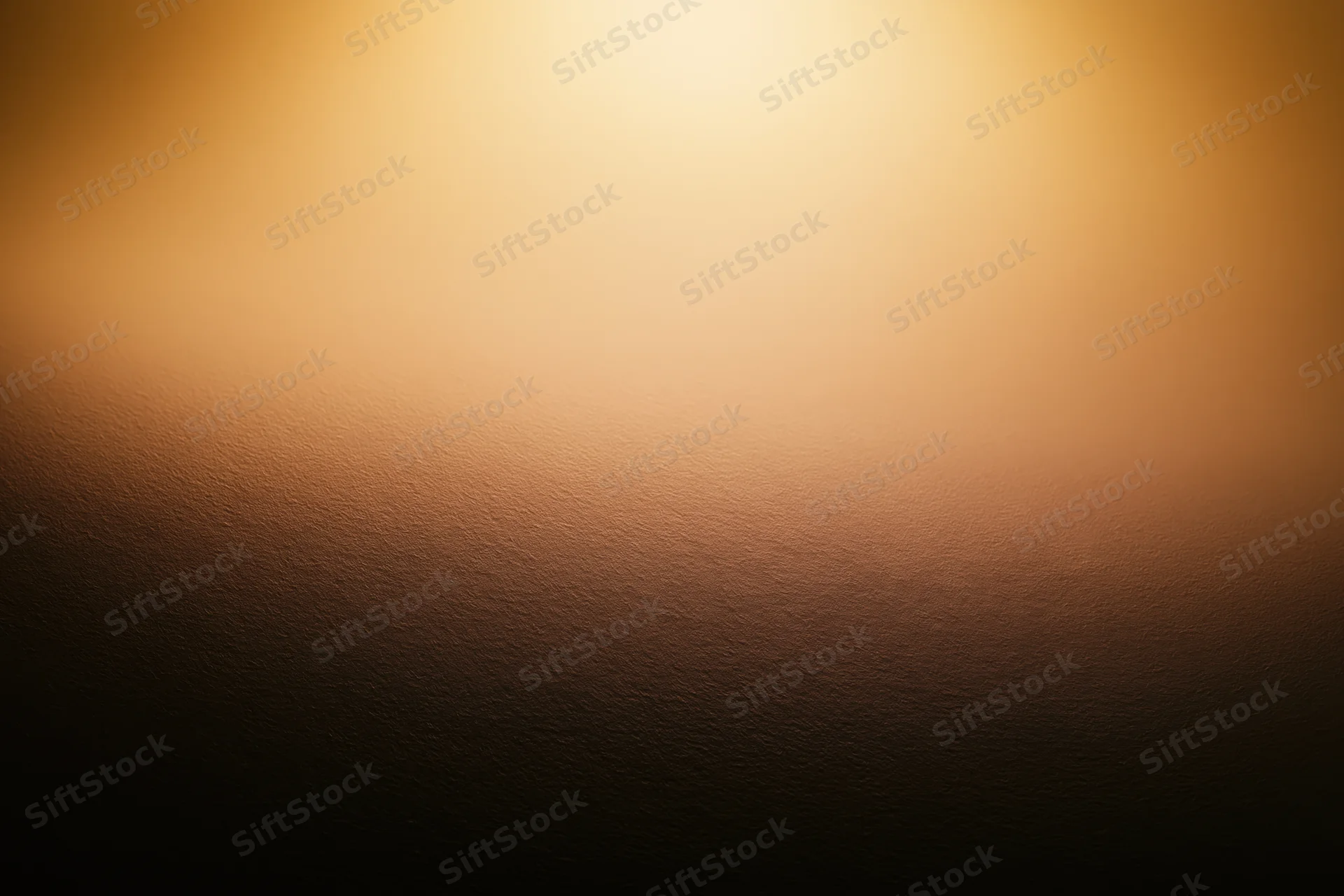 Warm gradient background with soft spotlight glow and textured surface