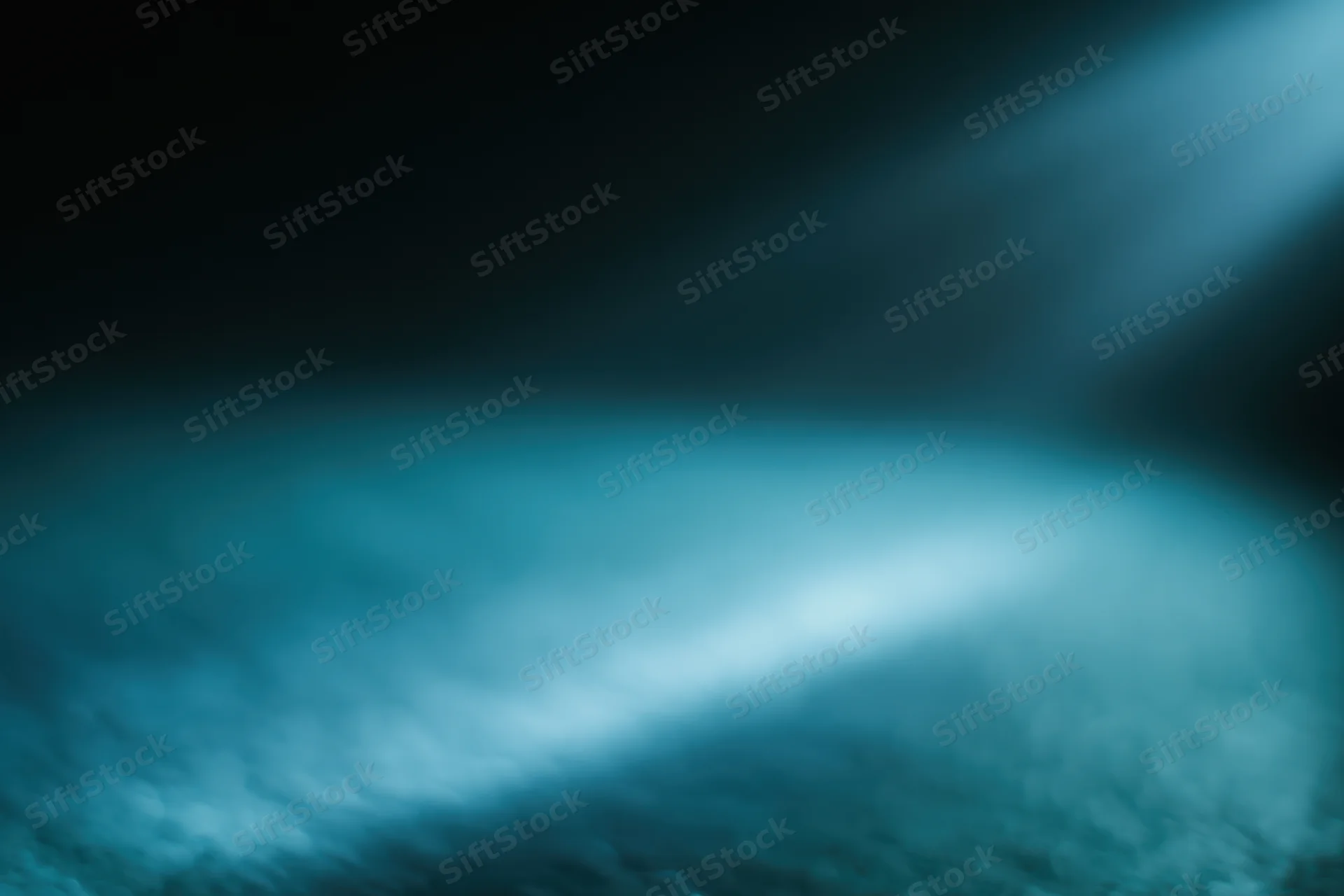 Soft blue gradient light effect on dark abstract background with copyspace