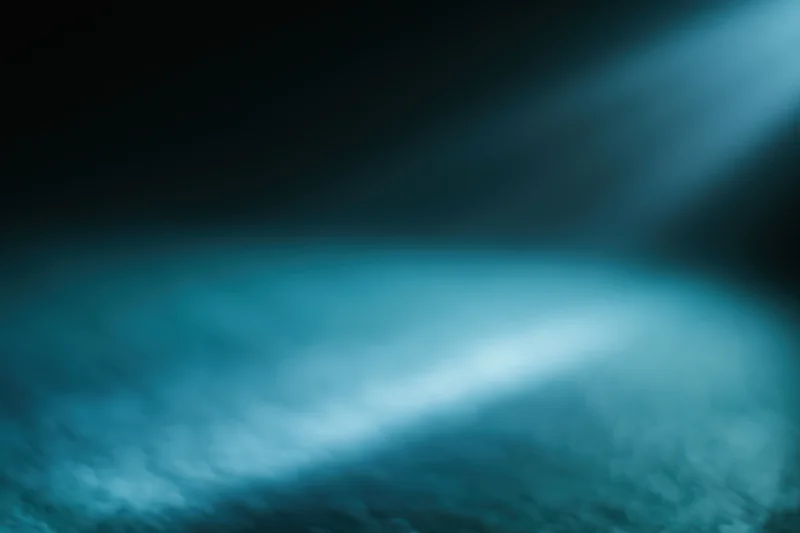 Soft blue gradient light effect on dark abstract background with copyspace