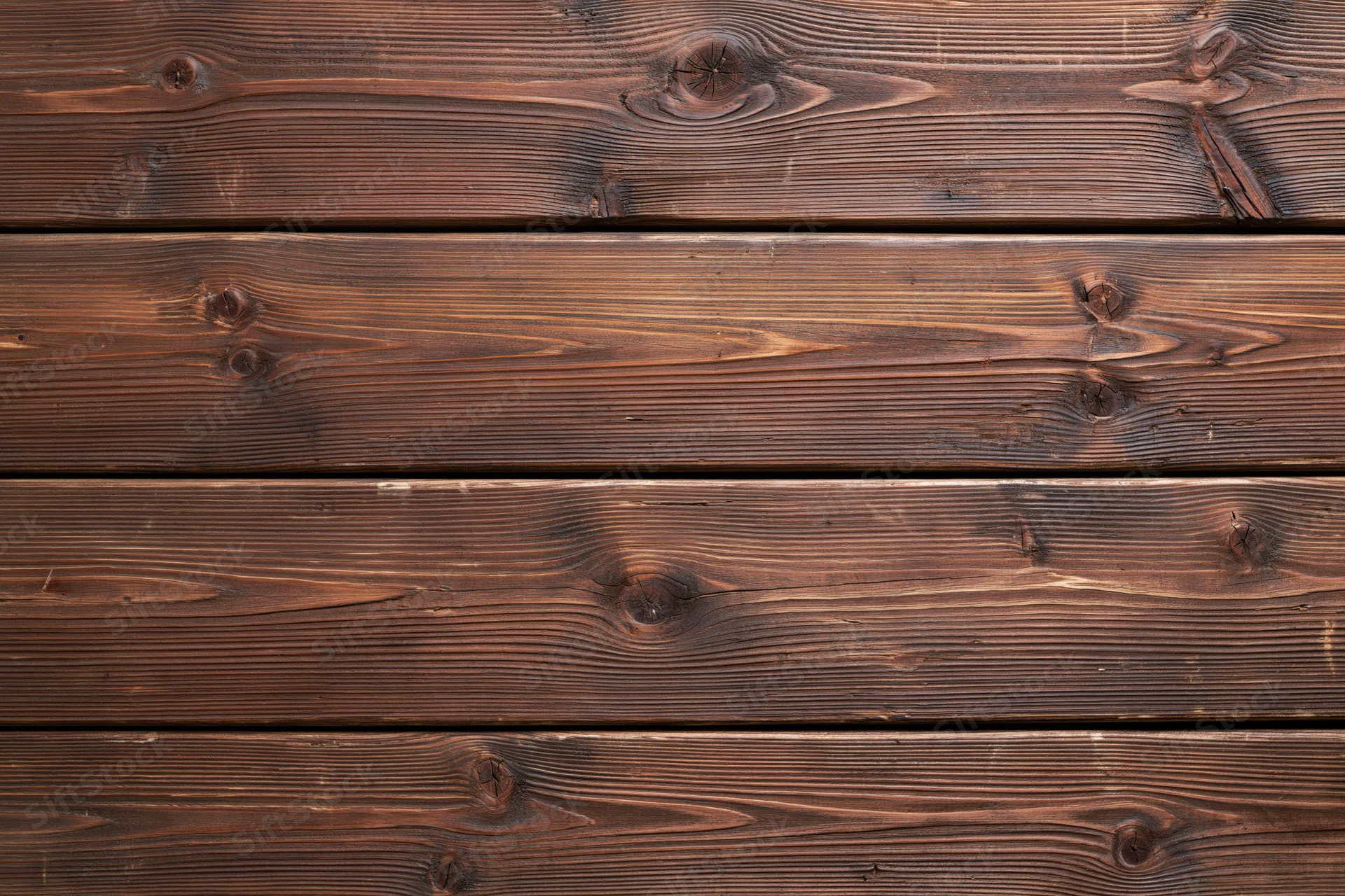 Horizontal aged wooden planks filling the frame as a textured surface