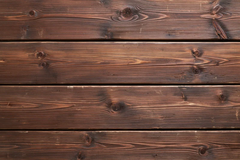 Horizontal aged wooden planks filling the frame as a textured surface