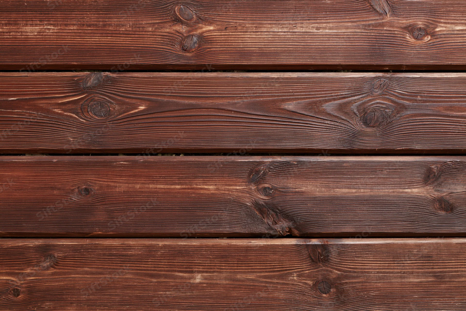 Horizontal aged wooden planks filling the frame as a textured surface