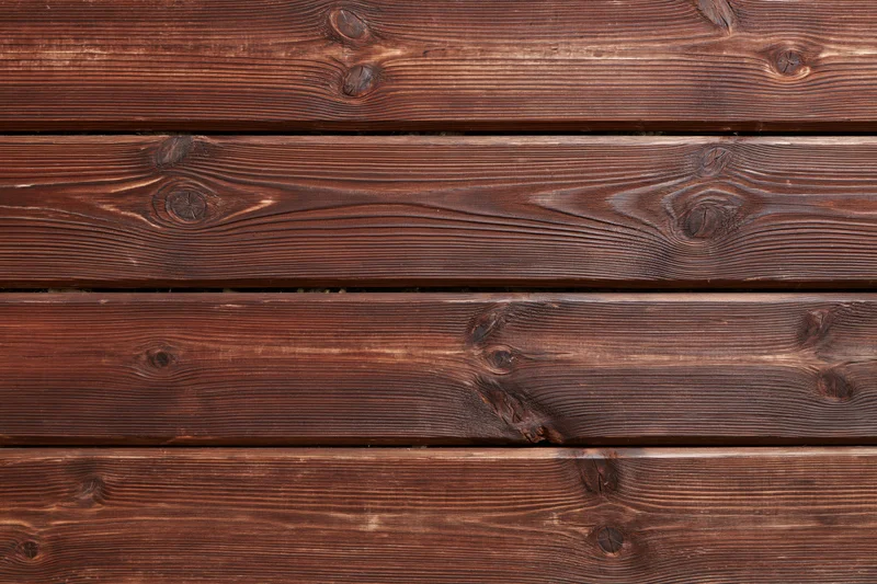 Horizontal aged wooden planks filling the frame as a textured surface