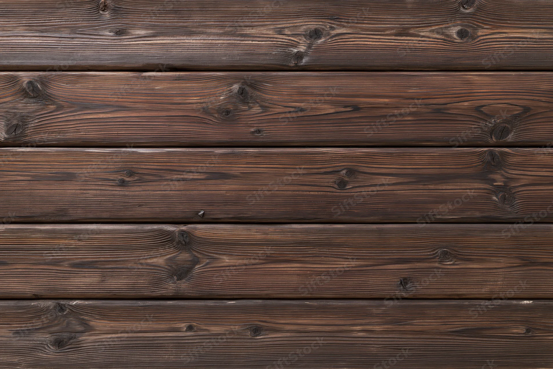 Horizontal aged wooden planks filling the frame as a textured surface