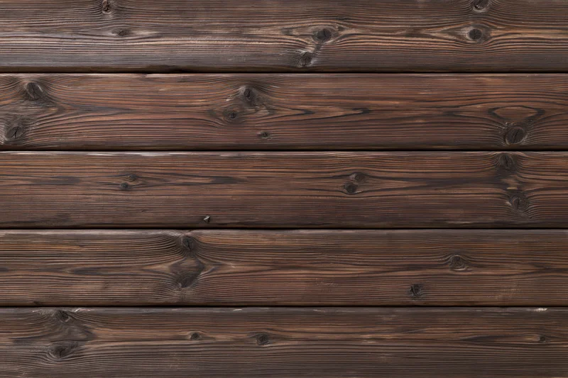 Horizontal aged wooden planks filling the frame as a textured surface