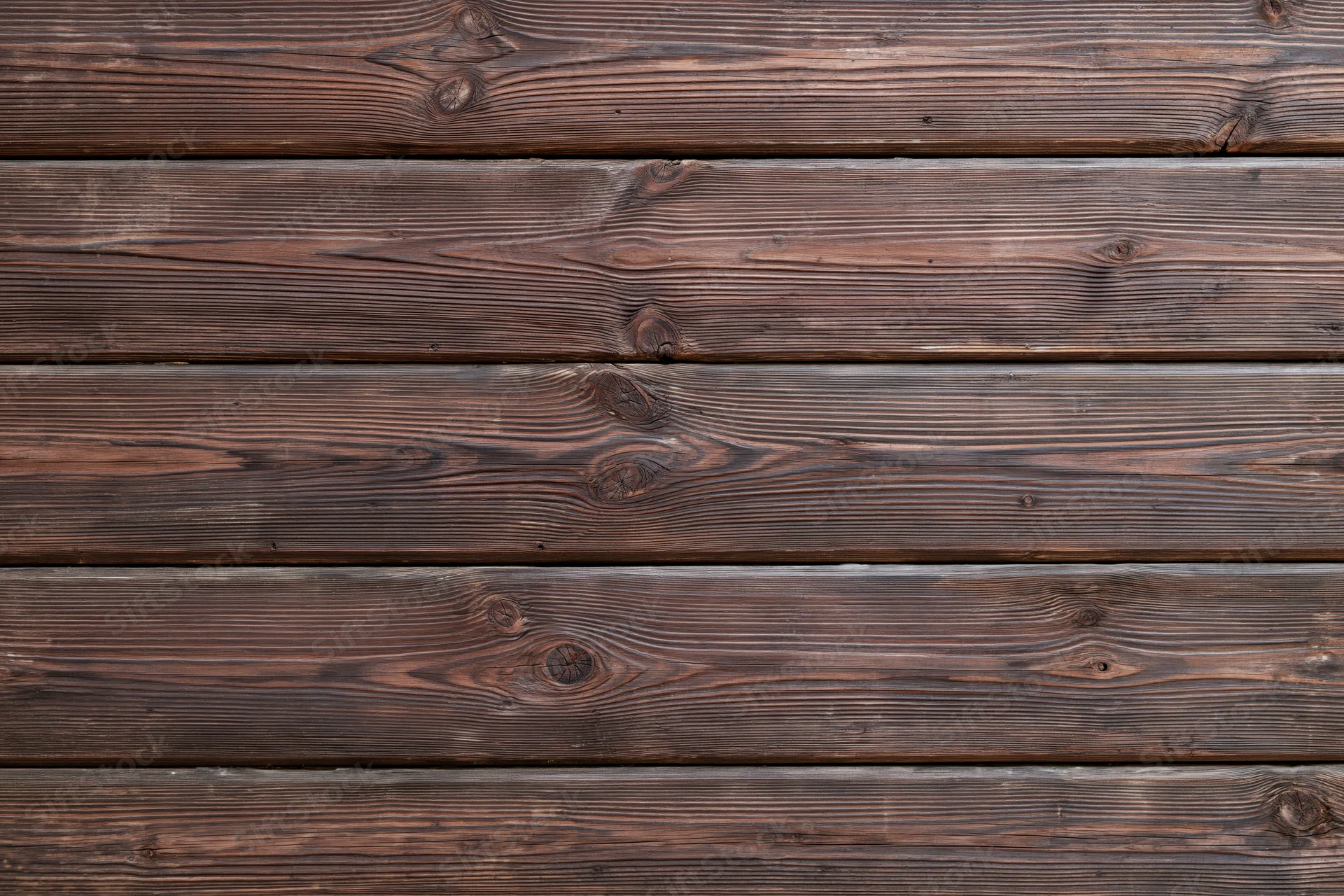 Horizontal aged wooden planks filling the frame as a textured surface