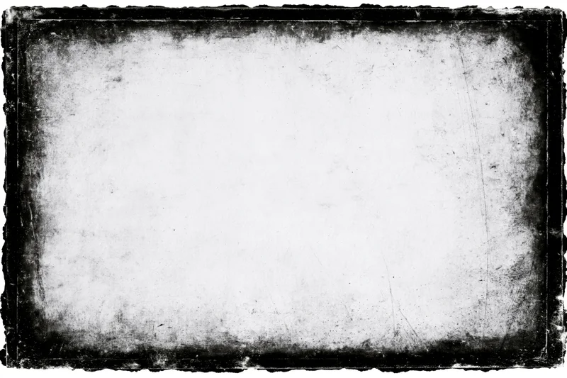Aged grunge photo frame with dark distressed borders and central white space