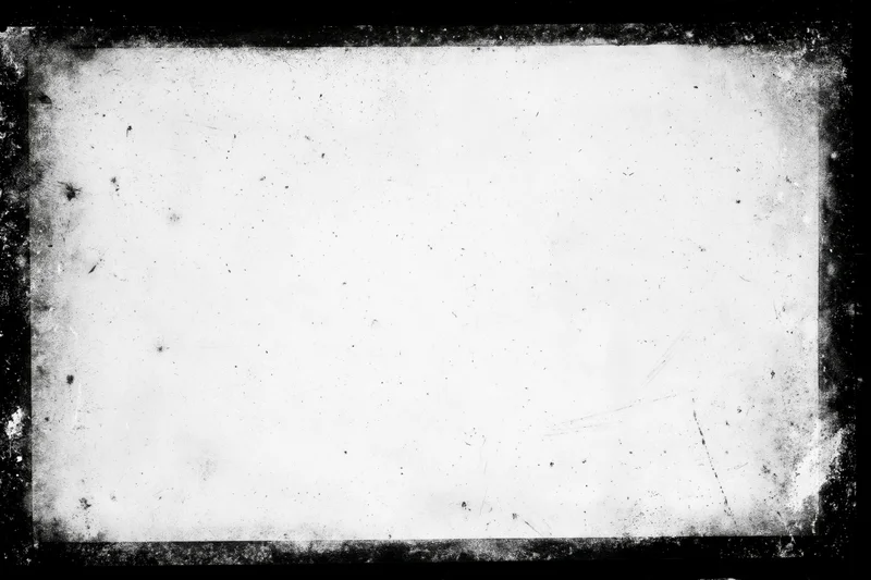 Aged photographic paper with heavy grunge border and distressed texture
