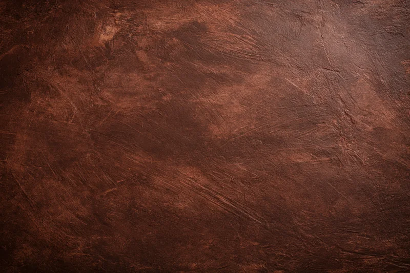 Aged plaster wall surface with rough textured finish filling the frame