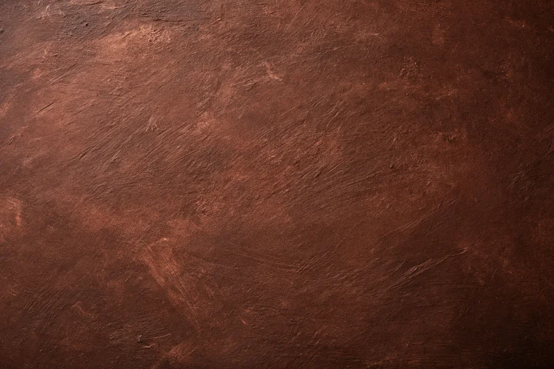 Aged plaster wall surface with rough texture filling the frame