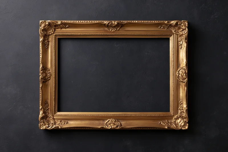 Ornate gold picture frame with carved details mounted on dark textured wall
