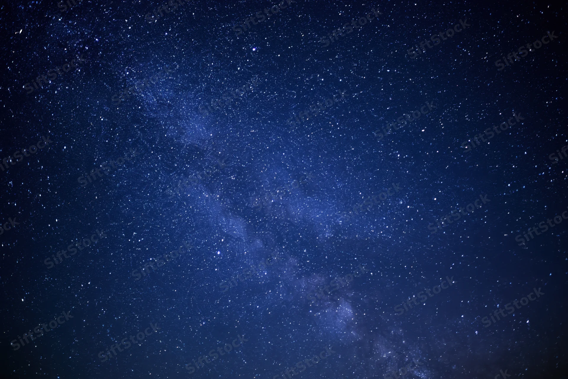 Night sky filled with stars and the milky way visible across the frame