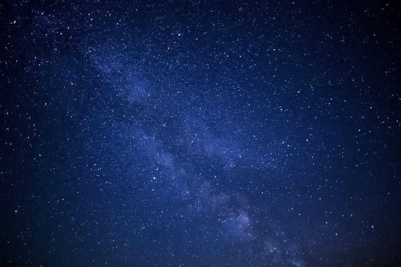 Night sky filled with stars and the milky way visible across the frame